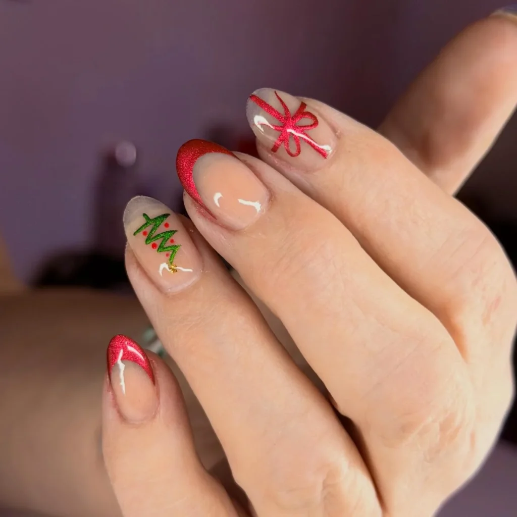 Red glitter French nails with Christmas tree and bow